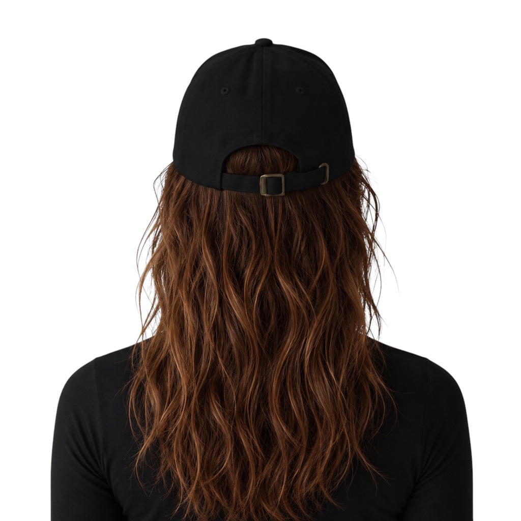 Woman wearing a black EH Crown Signature Classic Cap, back view showing the adjustable strap and antique buckle.