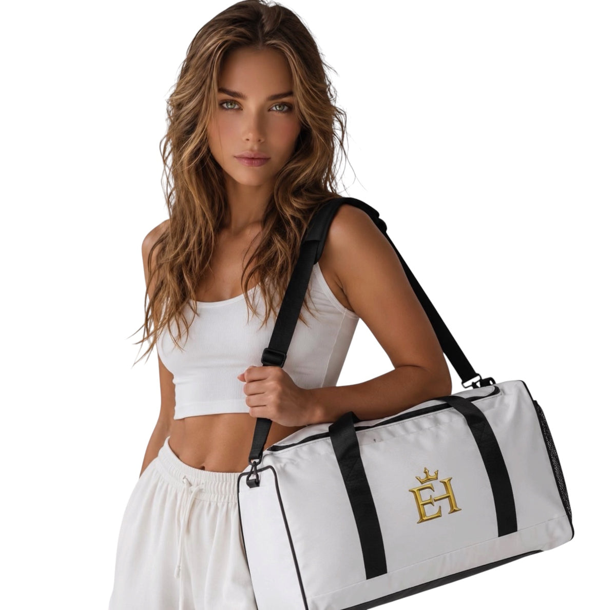 Woman carrying the white EH Crown Signature Premium Duffle Bag with black trim and gold EH Crown logo.