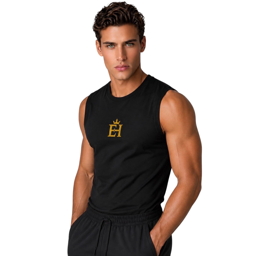 Man wearing a black premium muscle tank with gold EH Crown embroidery in a three-quarter hero pose.