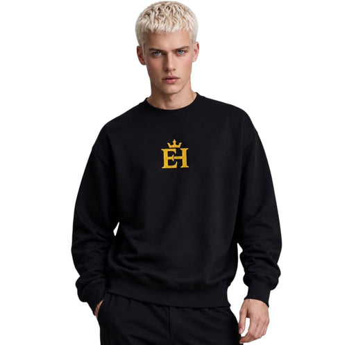 Man wearing the black EH Crown Signature Premium Sweatshirt with gold embroidered EH Crown logo, front view.
