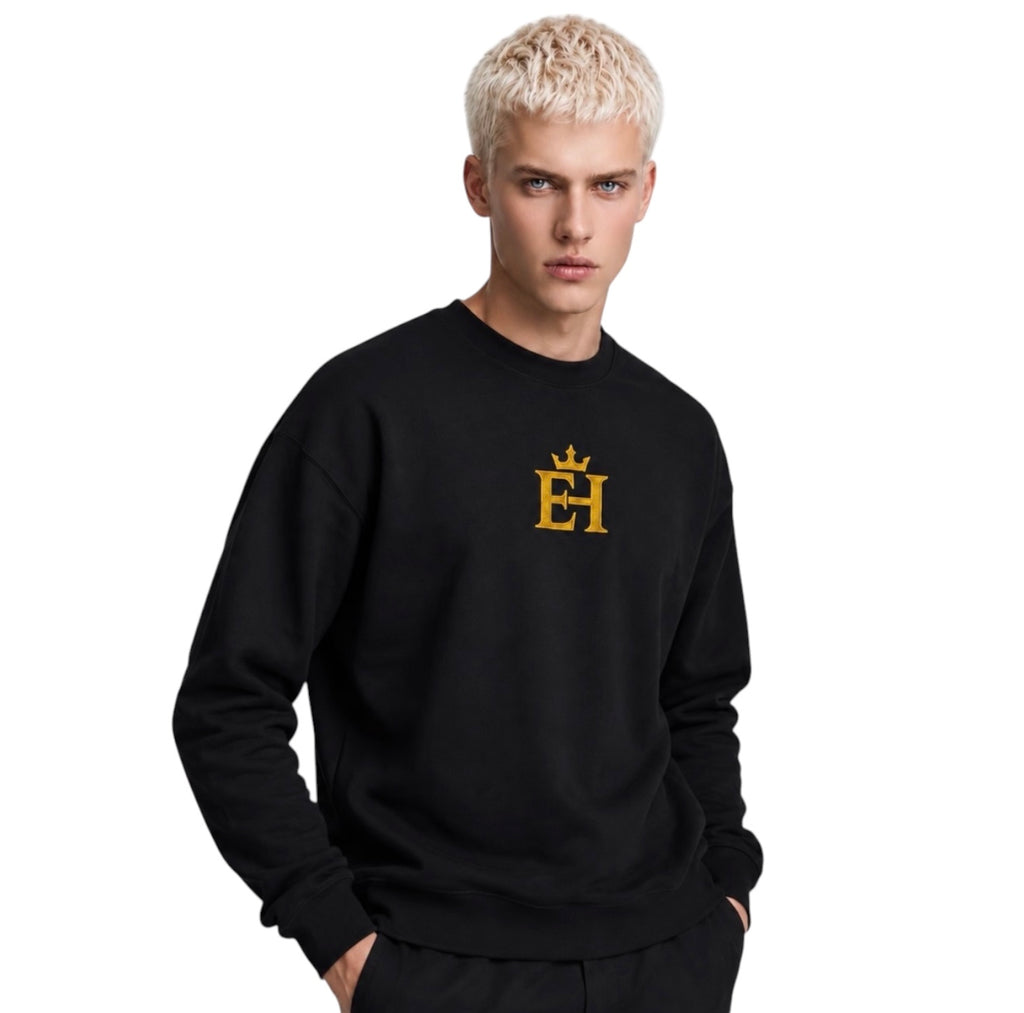 Man wearing the black EH Crown Signature Premium Sweatshirt with gold embroidered EH Crown logo, three-quarter view.