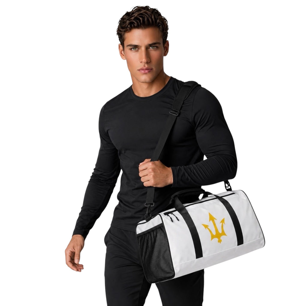 Man carrying INSPIRED Duffle Bag in white with black straps and gold infinity-trident emblem