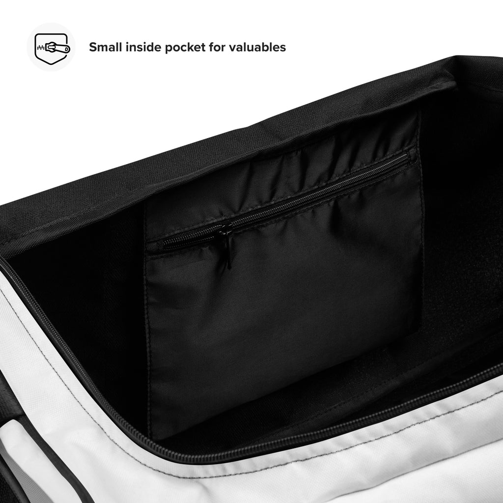 Small zippered inside pocket for valuables in the INSPIRED Duffle Bag