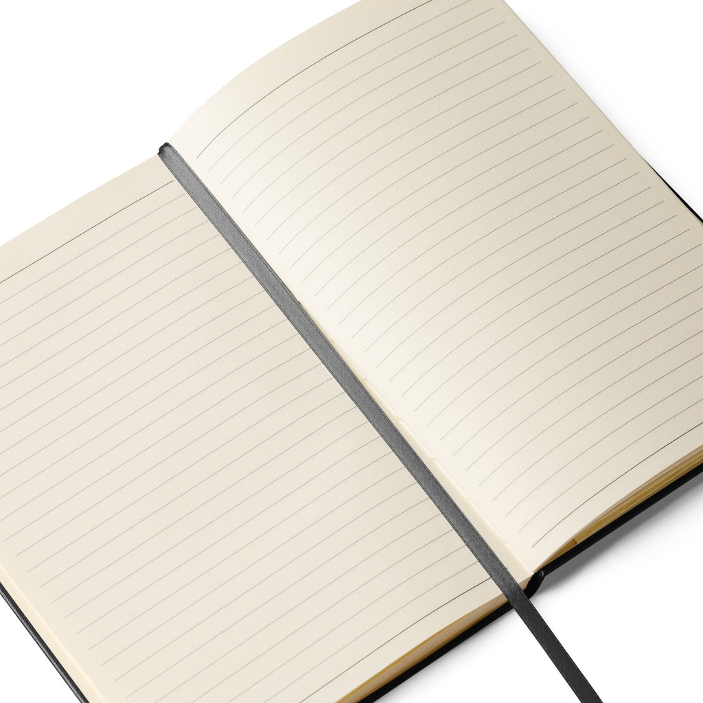 Inspired Legacy hardcover notebook open with lined cream pages