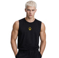 Male model wearing the black INSPIRED Muscle Tank with gold infinity-trident emblem, front hero view.