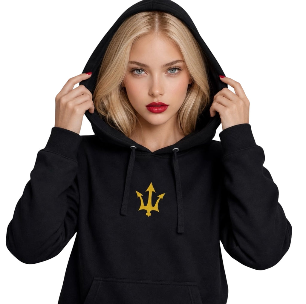 Female model wearing the INSPIRED Pullover Hoodie with hood up in black and gold.