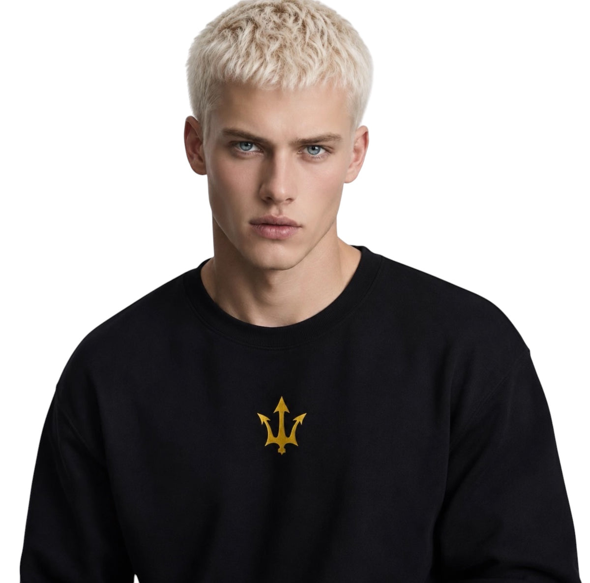 Male model wearing the INSPIRED Sweatshirt in black with gold infinity-trident emblem, front close-up view.
