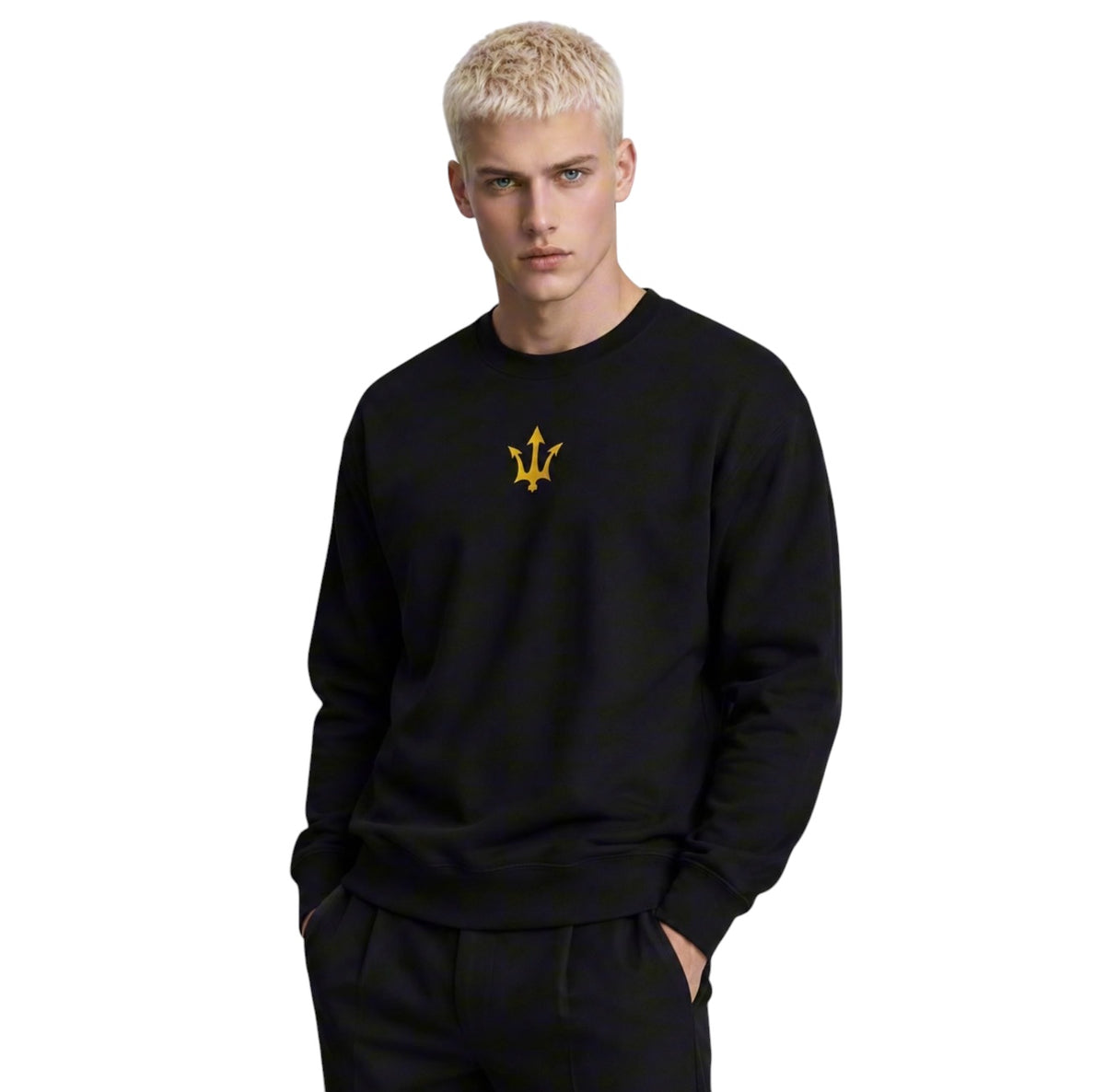 Male model wearing the INSPIRED Sweatshirt in black with gold infinity-trident emblem.